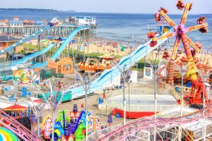 Powersurge, Kiddieland, and Beach | Rides Banner | Palace Playland | Old Orchard Beach, ME